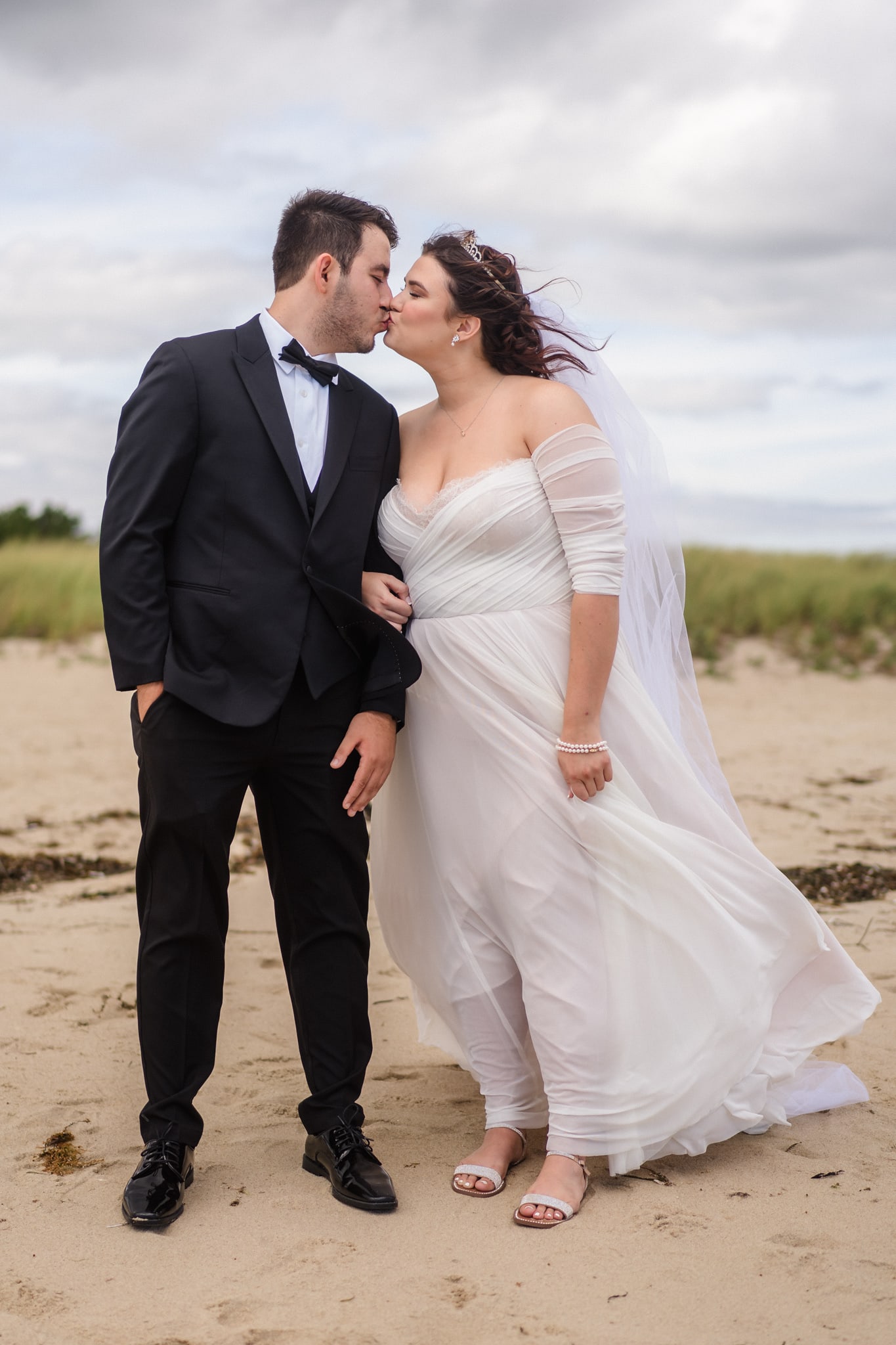 Wedding Couple Kissing On Beach